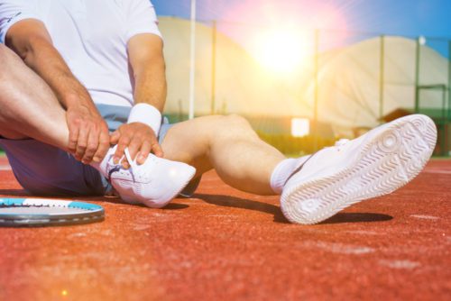 Unfallversicherung - Umknicken mit dem Fuß beim Tennisspiel als Unfall
